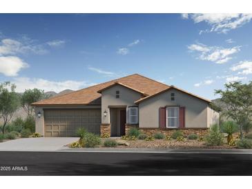 Charming single-story home features a neutral color palette, stone accents, and a well-manicured front yard at 17204 W Blue Sky Dr, Surprise, AZ 85387