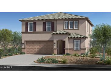 Stunning two-story home with a neutral color scheme, attached garage, and desert landscaping in a desirable community at 18244 W Tohono Dr, Goodyear, AZ 85338