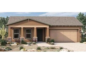 Charming single-story home features a cozy front porch, two-car garage, and low-maintenance desert landscaping at 32978 N 132Nd Ln, Peoria, AZ 85383