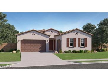 Charming single story home with a two-car garage and nicely landscaped front yard at 15044 W Gray Fox Trl, Surprise, AZ 85387