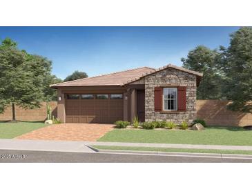 Charming single-Gathering home with brick driveway, two-car garage and beautiful stone accents at 3123 S 155Th Ln, Goodyear, AZ 85338
