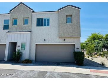 Charming two-story home with a two-car garage and well-maintained landscaping at 8330 N 22Nd Ln, Phoenix, AZ 85021
