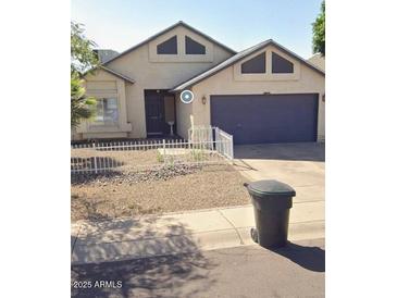 Charming single-story home with a well-maintained yard and attached two-car garage at 1122 N 87Th St, Scottsdale, AZ 85257