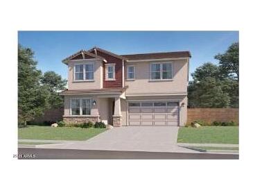 Inviting two-story home with a well-manicured lawn and a spacious two-car garage at 8323 E Peterson Ave, Mesa, AZ 85212