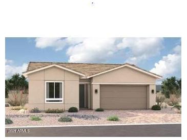 Charming single-story home featuring desert landscaping, a two-car garage, and a neutral color palette at 15818 W Miami St, Goodyear, AZ 85338