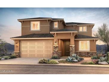 Charming two-story home featuring desert landscaping, a two-car garage, and stucco siding at 13758 W Whisper Rock Trl, Peoria, AZ 85383