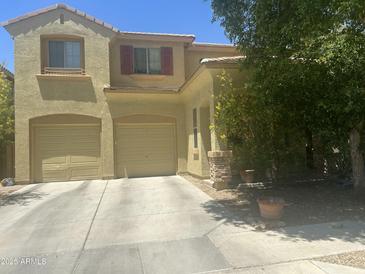 Charming two-story home with a two car garage and landscaped front yard at 3636 E Parkview Dr, Gilbert, AZ 85295