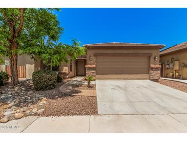 Charming single-Gathering home with a desert landscape and a two-car garage at 11826 W Villa Hermosa Ln, Sun City, AZ 85373