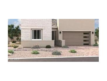 Charming two-story home featuring a neutral color palette and attached two car garage at 15842 W Miami St, Goodyear, AZ 85338