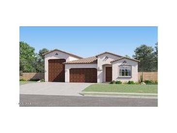 Charming single-story home featuring a three-car garage and a well-manicured front yard at 3160 E Craftsman Ln, San Tan Valley, AZ 85140