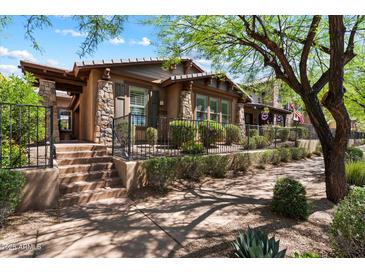 Charming single-story home with stone accents and a well-maintained front yard at 9262 E Desert Park Dr, Scottsdale, AZ 85255