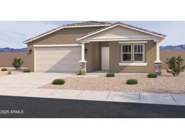 Charming single-story home with a stucco exterior, well-maintained landscaping, and an attached two-car garage at 16174 W Bajada Rd, Surprise, AZ 85387
