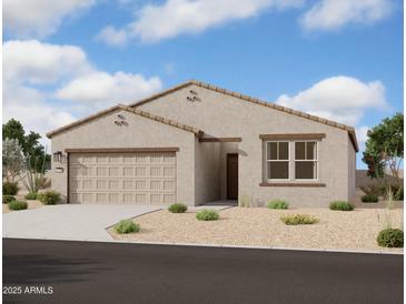 Charming single-story home with a two-car garage and low maintenance desert landscaping at 46868 W Coe St, Maricopa, AZ 85139