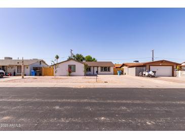 Charming single-story home featuring desert landscaping, a new roof, and a spacious driveway at 3812 W Seldon Ln, Phoenix, AZ 85051