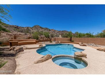 Backyard pool and jacuzzi with desert views at 11238 N 11Th St, Phoenix, AZ 85020