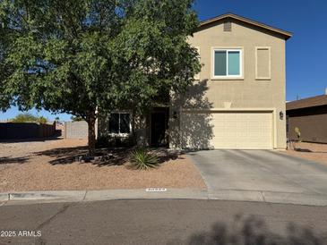 Well-maintained two-story home featuring a xeriscaped front yard and an attached two-car garage at 30394 N Appalachian Trl, San Tan Valley, AZ 85143