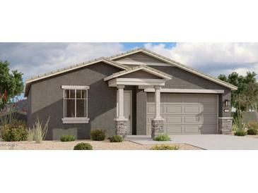 Charming single-story home with a neutral color palette, a two-car garage, and desert landscaping at 3322 E Valleyhigh Trl, San Tan Valley, AZ 85143
