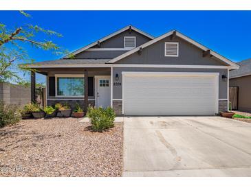 Charming single-Gathering home with a well-maintained front yard and two car garage at 5709 S 13Th Ave, Phoenix, AZ 85041