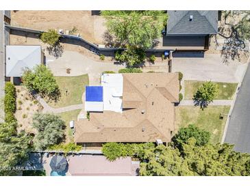 Aerial view of home showcasing the backyard, pool, mature trees, and surrounding neighborhood at 1274 E Edgemont Ave, Phoenix, AZ 85006