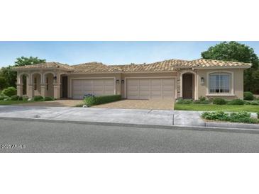 Charming, single story home boasting a tile roof, two car garage, neutral tones and mature landscaping at 17387 W Whispering Wind Rd, Surprise, AZ 85387