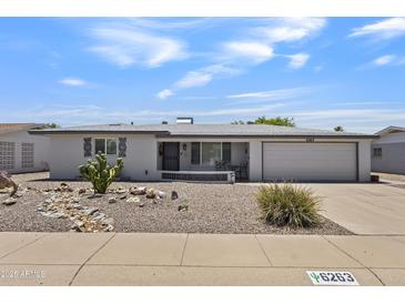 Charming single-story home with desert landscaping, neutral paint, and attached one-car garage at 6263 E Duncan St, Mesa, AZ 85205
