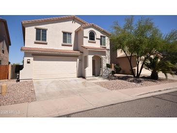 Charming two-story home with a two-car garage and neutral-colored stucco exterior in a Gathering-friendly neighborhood at 28377 N Desert Native St, San Tan Valley, AZ 85143