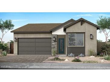Charming single-story home features a two-car garage, neutral paint, and low-maintenance landscaping at 2179 E Mill Rd, San Tan Valley, AZ 85140