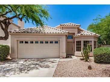 Charming single-story home showcasing a well-manicured front yard and a two-car garage at 786 S Catalina St, Gilbert, AZ 85233