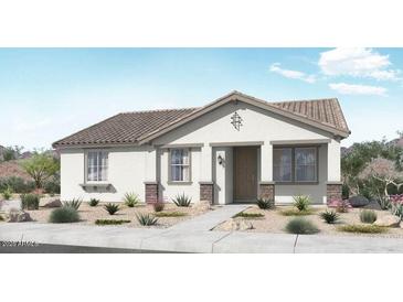 Charming single-story home with a neutral color scheme, desert landscaping and a tile roof at 14651 W Sand Hills Rd, Surprise, AZ 85378