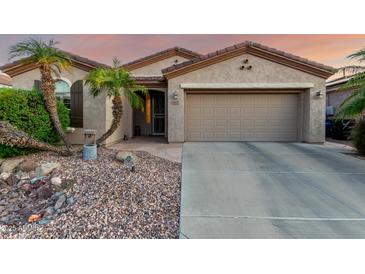 Charming single-story home featuring desert landscaping and a two-car garage at 4637 E Narrowleaf Dr, Gilbert, AZ 85298
