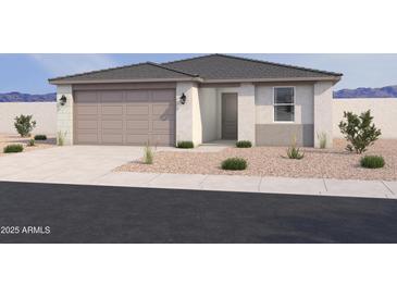 Charming single-story home showcasing a neutral color scheme, desert landscaping, and a two-car garage at 16182 W Bajada Rd, Surprise, AZ 85387