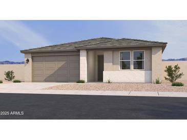 Charming single-story home featuring a neutral color palette, a two-car garage, and low-maintenance landscaping at 16189 W Bajada Rd, Surprise, AZ 85387