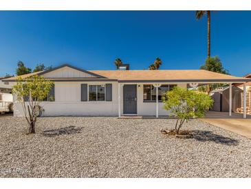 Charming single-story home featuring desert landscaping and a covered front entrance at 4526 W Mission Ln, Glendale, AZ 85302