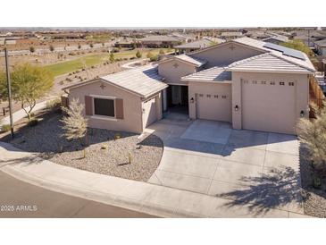 Beautiful single-Gathering home with a desert landscape and a three-car garage at 24847 N 175Th Dr, Surprise, AZ 85387