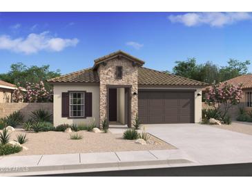 Inviting single-story home featuring a stone facade, a two-car garage, and desert landscaping for low maintenance at 42515 W Peters Dr, Maricopa, AZ 85138
