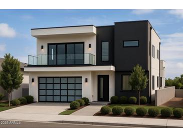 Striking modern two-story home featuring a sleek black and white color scheme, balcony, and an integrated garage at 4422 E Roma Ave, Phoenix, AZ 85018