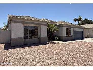 Charming single-story home with well-maintained landscape in a desirable neighborhood at 81 E Smoke Tree Rd, Gilbert, AZ 85296