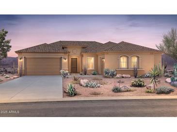Inviting single-story home featuring a neutral color palette, tile roof and low maintenance desert landscaping at 18858 N 269Th Ln, Buckeye, AZ 85396