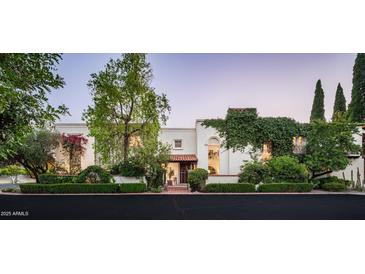 Charming home exterior showcasing lush landscaping and elegant architecture at 4316 N 40Th St, Phoenix, AZ 85018