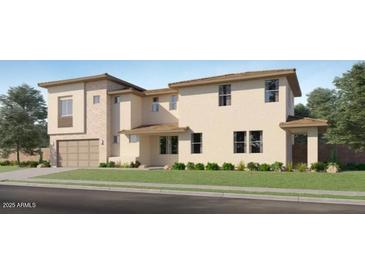 Beautiful new construction two-story home with a well-manicured lawn and neutral color palette at 10120 E Ulysses Ave, Mesa, AZ 85212