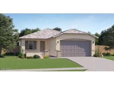 Charming single-story home with a well-manicured lawn and a neutral color palette at 16762 W Alameda Rd, Surprise, AZ 85387