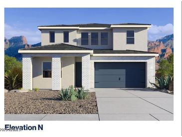 Charming two-story home boasting a modern garage and low-maintenance desert landscaping at 27383 N 69Th Dr, Peoria, AZ 85383