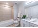 Modern bathroom features a shower over tub and vanity with a countertop at 3131 N Central Ave # 6011, Phoenix, AZ 85012