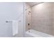 Modern shower over tub features neutral tile surround and chrome fixtures at 3131 N Central Ave # 6011, Phoenix, AZ 85012