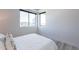 Bright bedroom features a large window offering city views and natural light at 3131 N Central Ave # 6011, Phoenix, AZ 85012