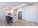 Modern kitchen featuring a center island with seating, white cabinets, and sleek appliances at 3131 N Central Ave # 6011, Phoenix, AZ 85012