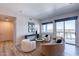 Bright living room showcasing modern furnishings, a balcony with city views, and natural light at 3131 N Central Ave # 6011, Phoenix, AZ 85012