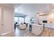 Open-concept living area showcasing modern decor, stylish furniture, and a large window with city views at 3131 N Central Ave # 6011, Phoenix, AZ 85012