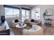 Inviting living room featuring a modern design, plush seating, and a view from large windows at 3131 N Central Ave # 6011, Phoenix, AZ 85012