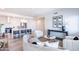 Open-concept living space with a modern kitchen, stylish seating, and contemporary decor at 3131 N Central Ave # 6011, Phoenix, AZ 85012